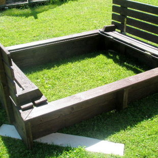 Smilšu kaste jautrām rotaļām